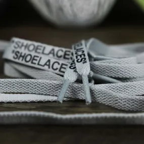 Flat Icey Grey Shoelaces with “Shoelaces” Print | 120cm Capswag