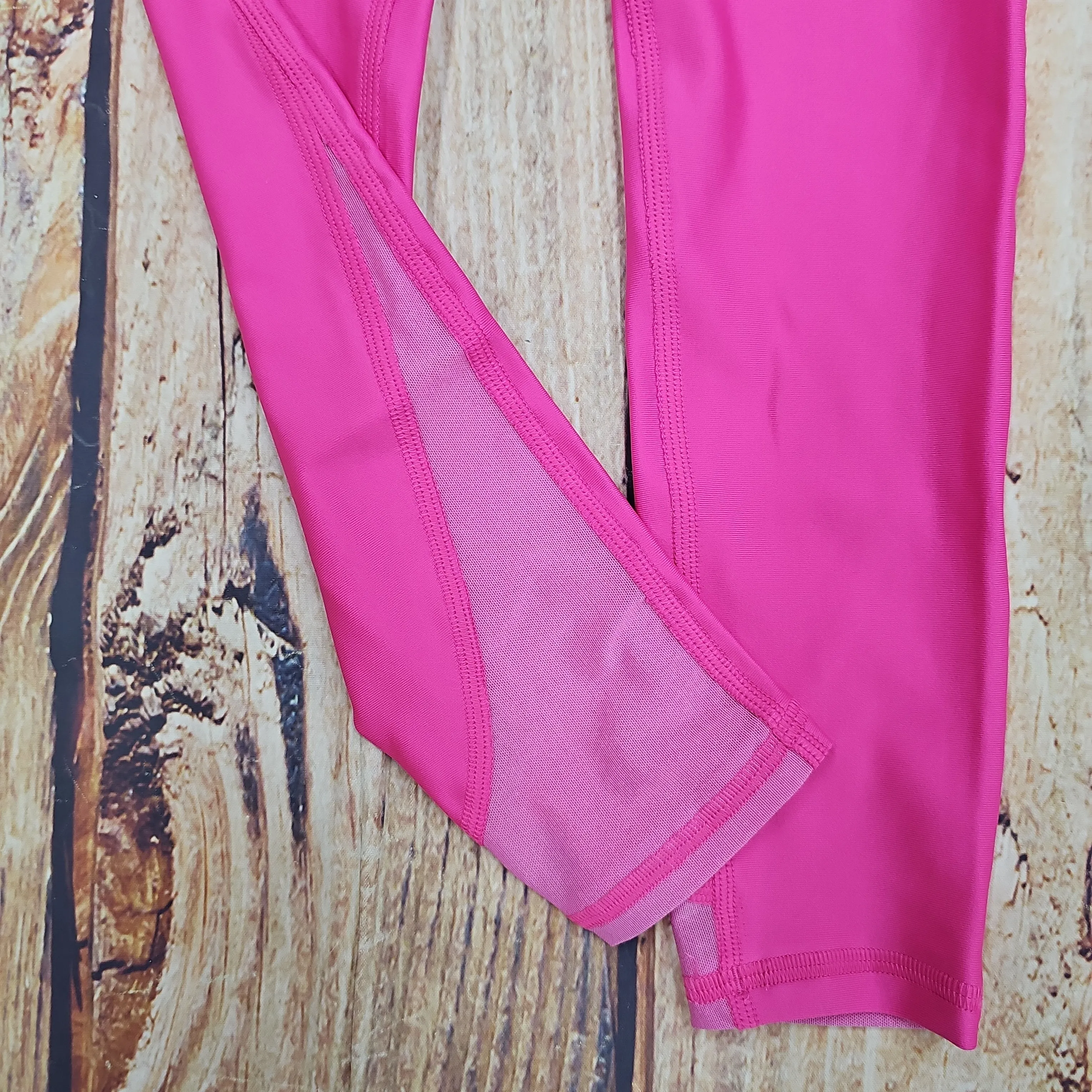 UA GIRLS ARMOUR LEGGING PINK